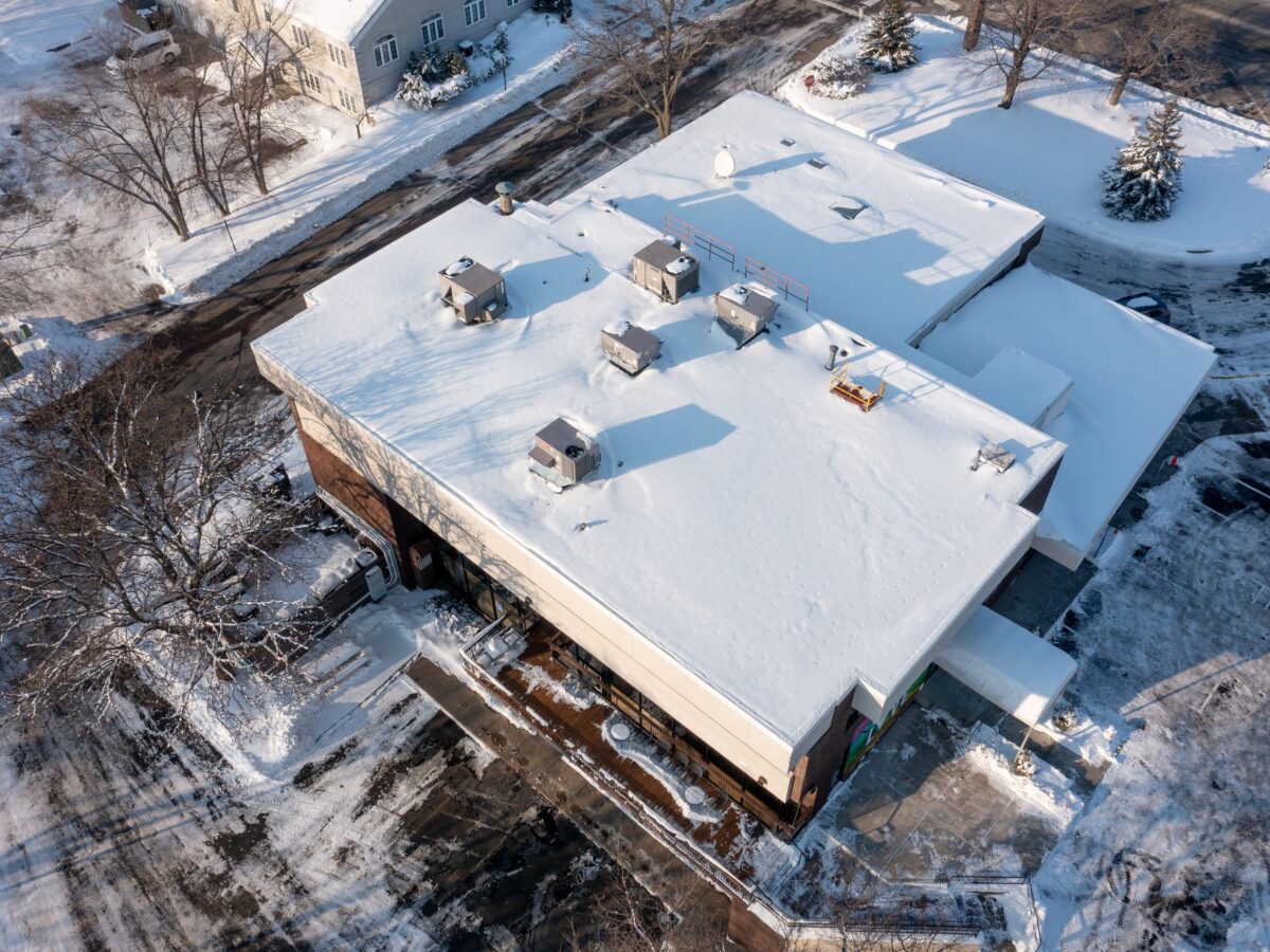 Freeze thaw commercial roof damage in Rochester